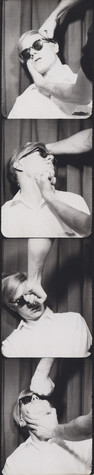 Four black and white photographs arranged in a column, all of which show Andy Warhol dressed in dark sunglasses and a white polo shirt being punched from different angles by the arms of a man not in the frame.