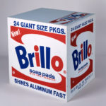 Andy Warhol's 1964 replica of a box of a Brillo soap pads using the midcentury red, white, and blue color scheme.
