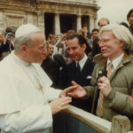 Andy Warhol meeting Pope John Paul II at the Vatican.
