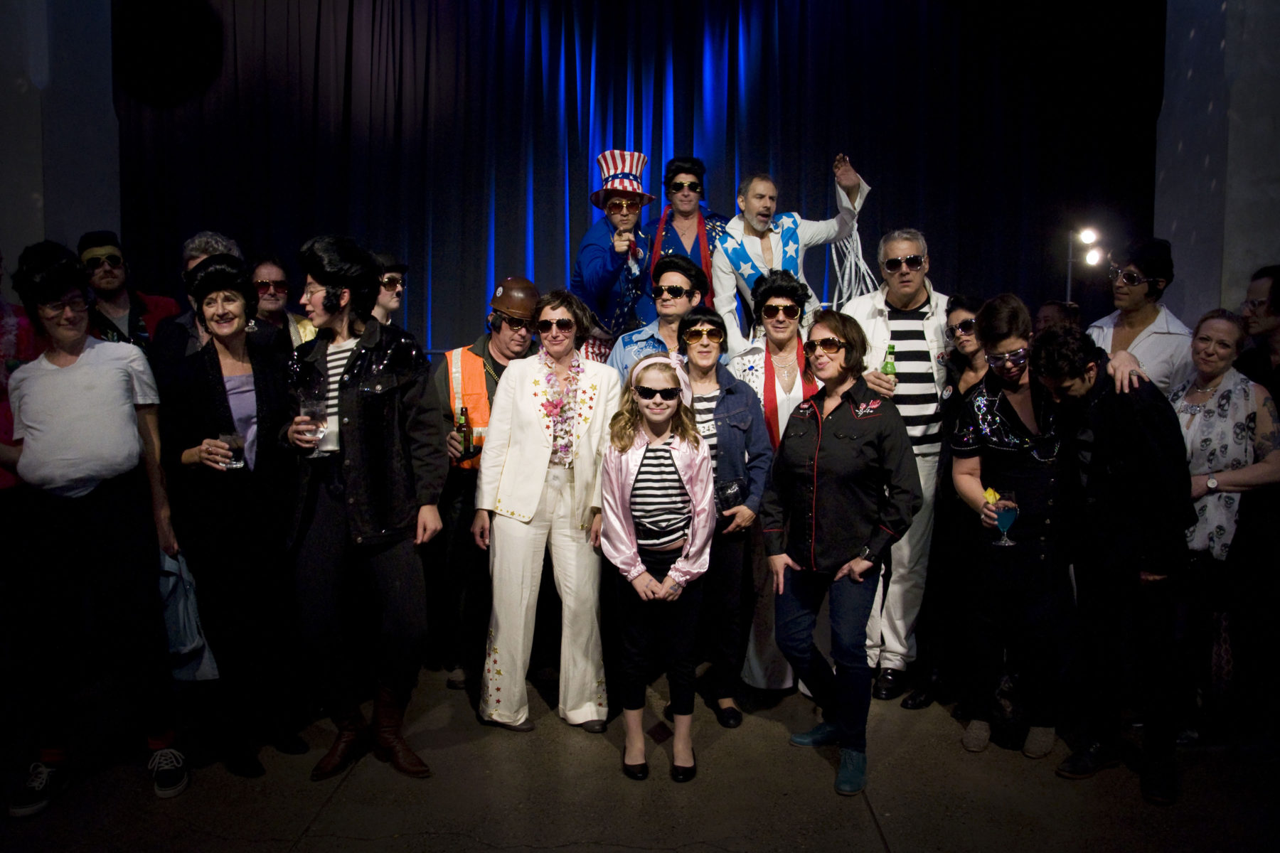 A large group dressed up as The King during the Night of 1,000 fundraising event.