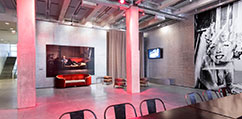 A wide angle view of the Warhol Museum lobby.