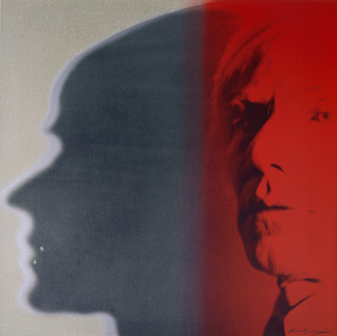 The right half of this silkscreen portrait is red and features an image of Andy Warhol’s face, gazing towards the viewer. The left side of the image features the silhouette of Andy’s face in profile, creating the illusion that his face has cast a shadow.