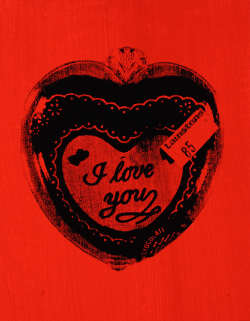 A vertical canvas is painted red with an image of a black heart-shaped box of chocolates screenprinted on top. The box says I love you in a cursive script. A small price tag on the box Lamstons and the number 85, indicating 85 cents.