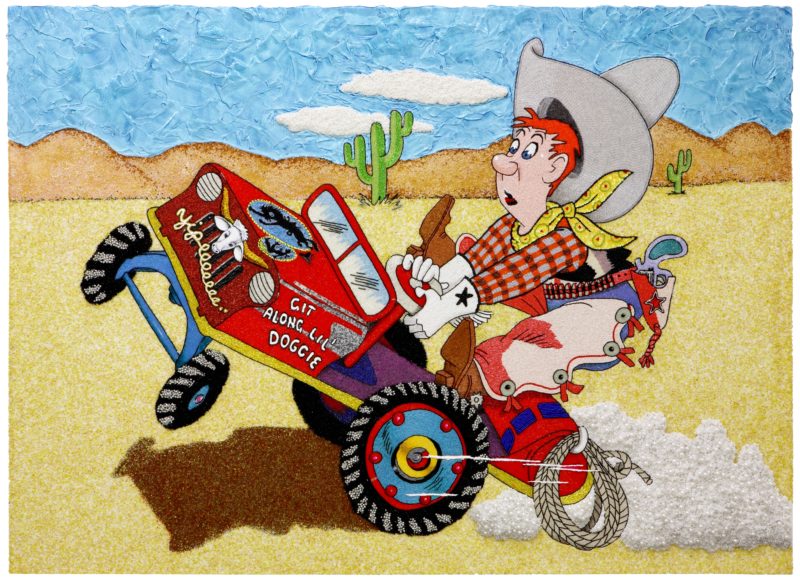 Embroidery of a cartoon-like character dressed like a cowboy and riding a truck through the desert.