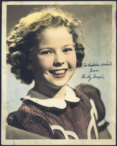 A card with an image of child actress Shirley Temple signed To Andrew Warhola with love Shirley Temple
