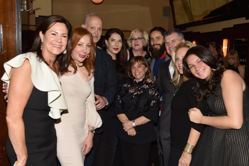 Board and staff members pose with John Waters, Marina Abramovic, Jared Leto, and friends at the 2018 New York City dinner fundraiser.