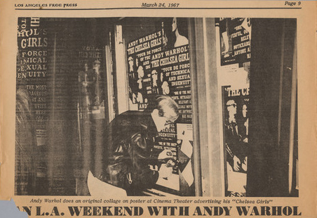 A yellowed newspaper clipping that has a black and white image of a man placing posters on a window.