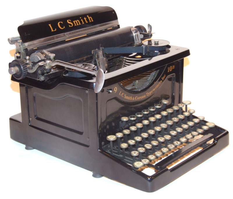 Side view of Cyrillic typewriter. The typewriter features the Cyrillic alphabet.
