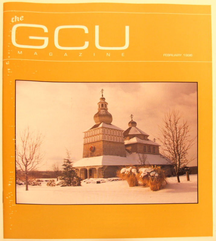 Cover of the February 1996 issue of GCU Magazine. The cover is orange and features an image of a snow-covered cathedral.