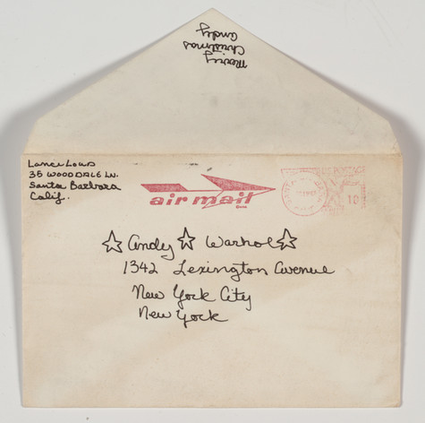 Envelope from Lance Loud in Andy Warhol, with return address in Santa Barbara, California. Postmarked 1968. Handwritten address with stars across Andy Warhol's name and a red air mail stamp on the front and Merry Christmas Andy across the sealing flap.