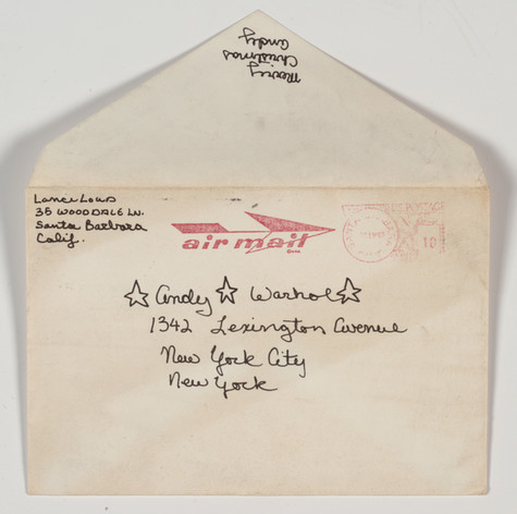 Envelope from Lance Loud in Andy Warhol, with return address in Santa Barbara, California. Postmarked 1968. Handwritten address with stars across Andy Warhol's name and a red air mail stamp on the front and Merry Christmas Andy across the sealing flap.