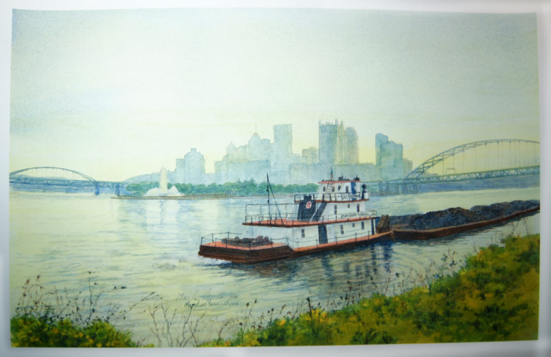 Scanned digital print of an original painting. The painting shows a Pittsburgh skyline in the background, with a boat on the riverbank in the foreground.