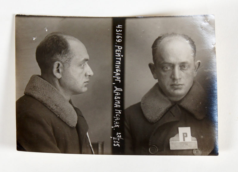 Front view of black and white mugshot photo featuring a man.