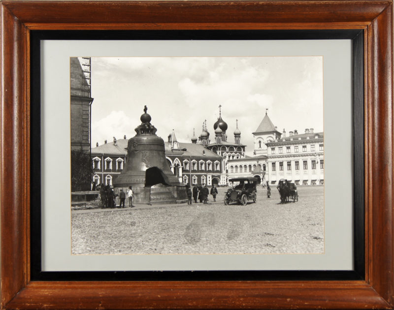 Sepia photograph of the Tsar Bell. The photograph is in a brown wood frame with a black interior border.
