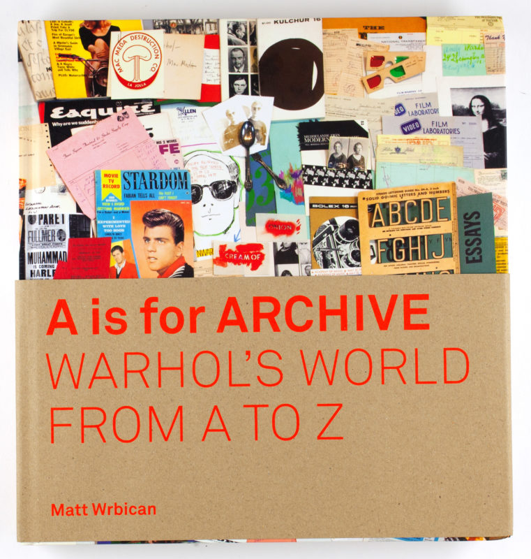 Book cover with an eclectic collage that reads, “A is for Archive: Warhol’s World from A to Z” in red.