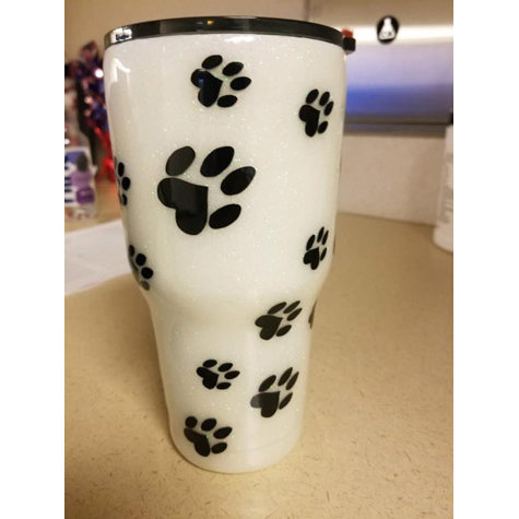 Tumbler with black paw prints