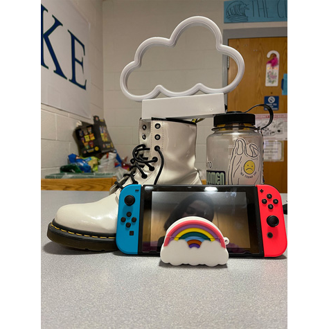 Still life objects: a rainbow, boot, cloud and other objects