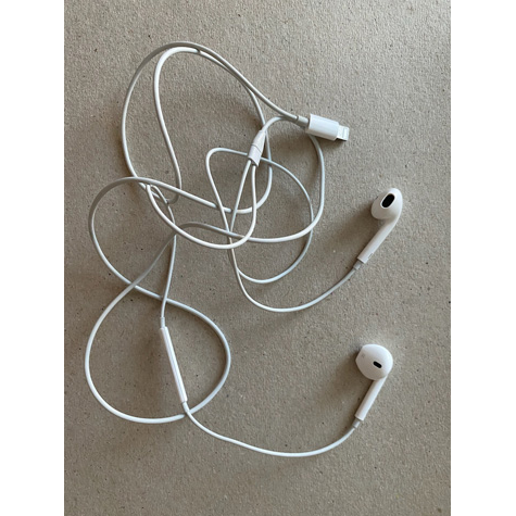A pair of white Apple earbuds