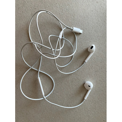 A pair of white Apple earbuds