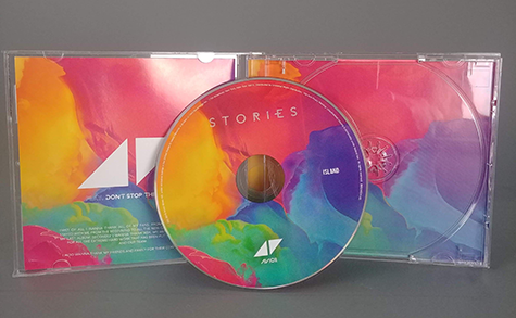 A colorful cd in front of a cd case