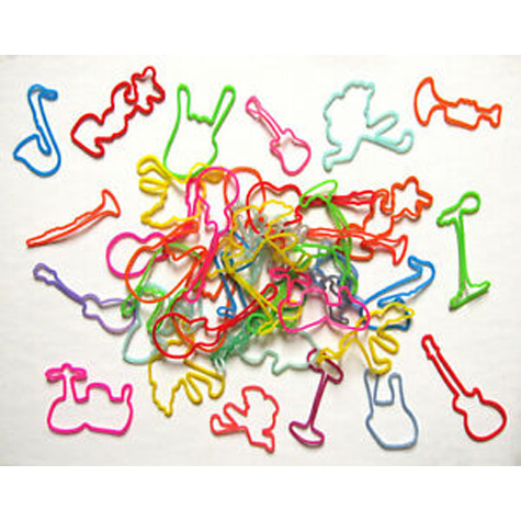 A pile of multi-colored rubber bands in a pile.