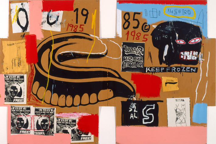 A painting by Jean-Michel Basquiat and Andy Warhol done on a flattened cardboard box. Warhol's rendering of a set of dentures in black paint dominates the center of the artwork, and a painting of a black head with big white teeth and red eyes by Basquiat appears on the right side. The numbers 1985 appear multiple times.