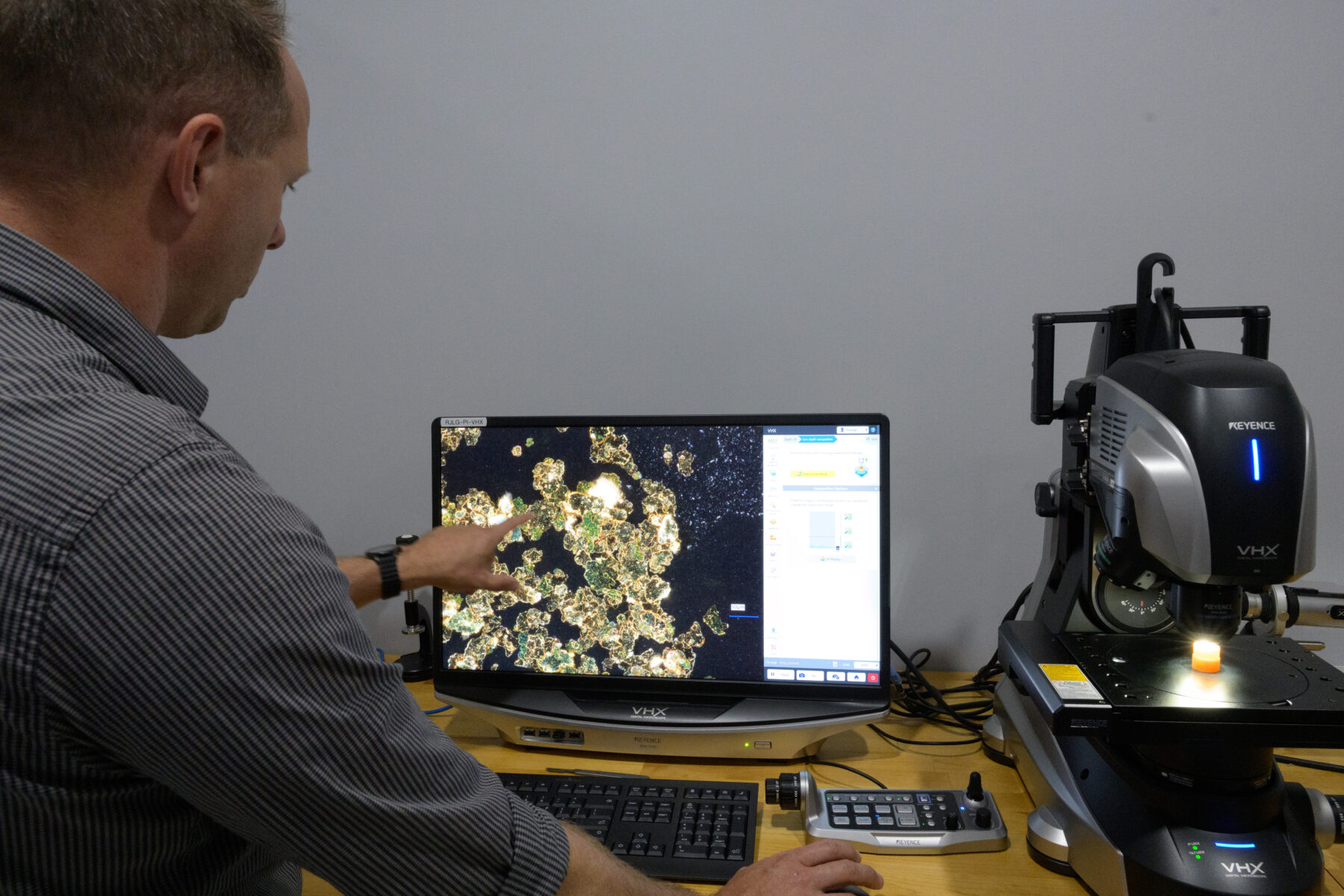 Man conducts further analysis using the digital microscope.